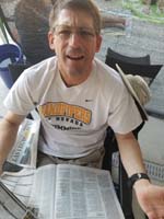 34-Daddy_wondering_why_Mommy_is_taking_a_photo_of_him_while_reading_newspapers