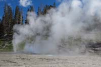 080-Vent_and_Turban_Geysers_blowing,Grand_Geyser_pool_bubbles