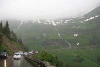 016-another_big_cascading_waterfall,road_is_busy_even_with_the_rain