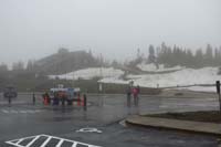 026-Logan_Pass_Visitor_Center_inside_is_wall_to_wall_people
