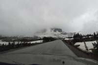 104-approaching_Logan_Pass_Visitor_Center-clouds_rolling_back_in_again