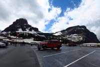 37-scenic_view_from_Logan_Pass_Visitor_Center_with_historic_Red_Bus_Tours_vehicle