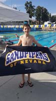 06-Kenny_shows_off_his_Sandpiper_towel-very_happy_boy