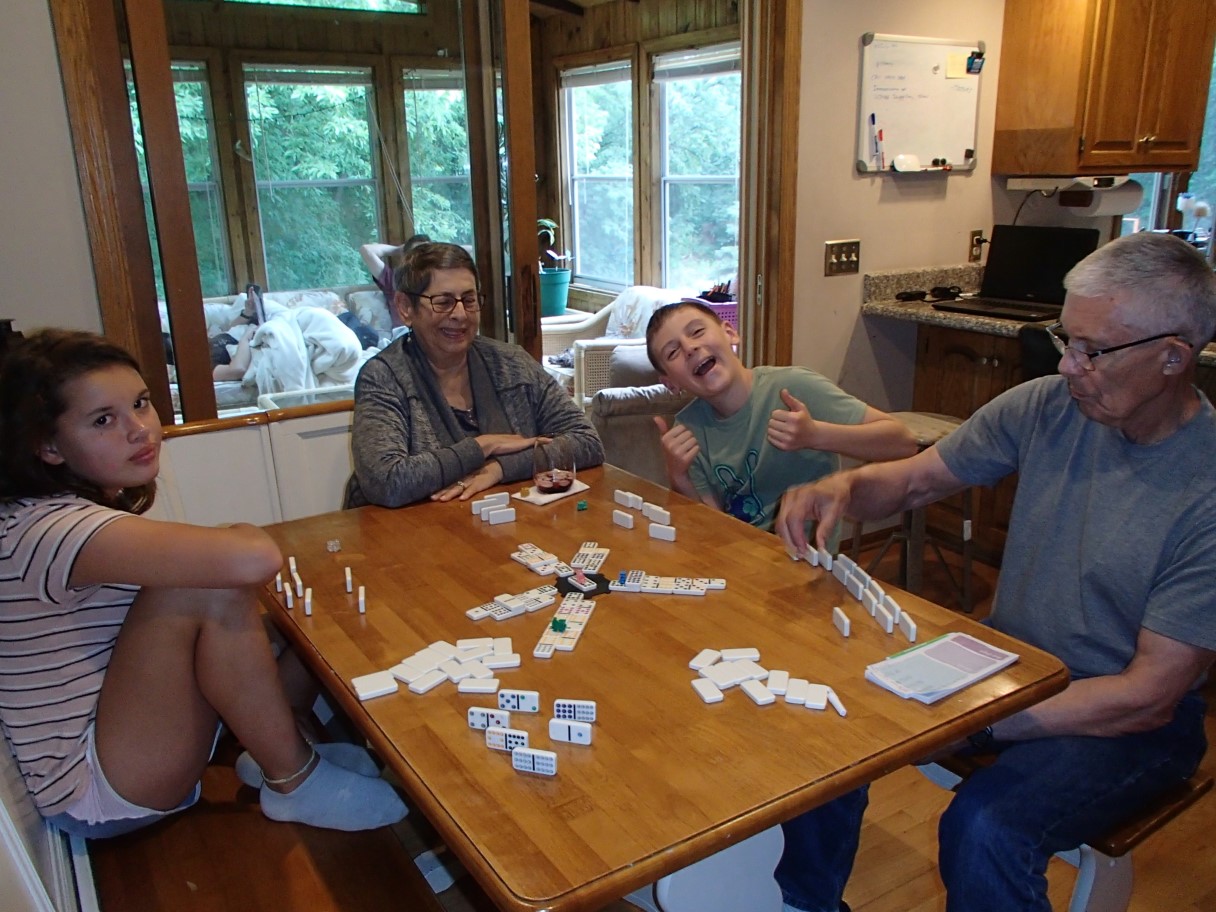 072-playing_Mexican_Train_Dominoes