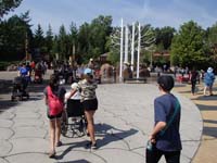 019-Leyna_pushing_Baba_through_the_zoo_in_a_wheelchair,Kenny_and_Brooke_follow_along
