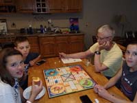 059-kids_playing_parcheesi_with_Poppy