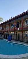 02-Kenny_and_Wade_at_the_hotel-no_you_can't_jump_into_the_pool_from_2nd_floor
