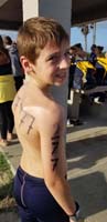 34-Kenny_shows_off_his_number