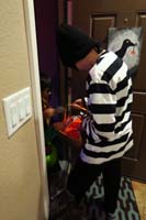 14-Kenny_hands_out_treats_to_the_kids-Rainier_wants_in_on_the_action
