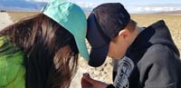 06-Nardia_and_Kenny_check_out_a_chunk_of_salt