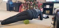 58-rolling_out_muscles_between_prelims_and_final_break_at_home_since_close_by