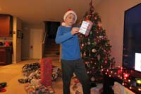 15-Kenny_enjoys_handing_out_presents_to_everyone