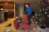 17-Kenny_opening_more_gifts_for_himself