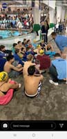 16-Kenny's_in_there_with_blue_towel-getting_pep_talk_from_Coach_Chris