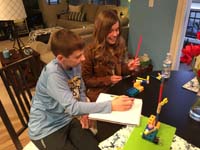 05-discussing_strategy_with_Shelby_due_to_a_stellar_fail_at_Write_It_Do_It-Mommy_coaching_from_background