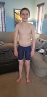36-big_effort_to_squeeze_Kenny_into_a_teenie_tiny_tech_suit