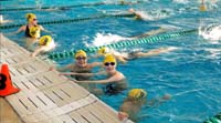 02-Kenny_during_early_morning_warm_ups,trying_to_get_more_Spring_Junior_Olympic_cuts