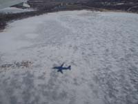 18-frozen_lake_and_shadow_of_our_plane