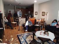24-family_hangs_out_in_their_home