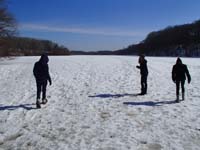 33-kids_walking_on_a_frozen_lake