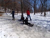 42-kids_scoot_down_the_icy_slope
