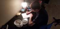 05-now_he_works_on_a_Write_It_Do_It_contraption