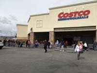 24-1100am-doors_closed_due_to_too_many_people_in_store-line_outside_building