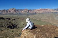 15-Kenny_sits_on_the_edge_of_Muffin_Peak_enjoying_the_scenic_view