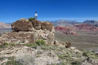 22-Kenny_on_another_boulder_with_Calico_Hills_in_background