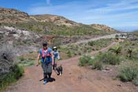 12-looking_back_to_trailhead-starting_our_hike-up_a_portion_of_a_dirt_road