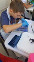 020-Kenny_follows_instruction_for_dissecting_the_worm
