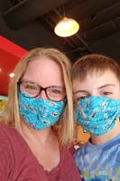 048-Mommy_and_Kenny_with_their_matching_swim_masks_out_in_public