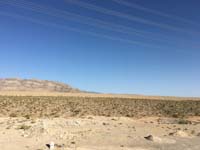 091-next_morning_with_clear_skies,as_if_fire_is_out,still_burning_for_several_more_days,high_winds_stop
