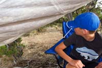 13-had_to_lower_the_tarp_to_let_the_rain_run_off-'tent_is_peeing'