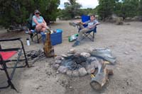 41-creative_use_of_wood_and_rocks_to_balance_pie_irons_to_cook_the_pizzas_over_hot_coals