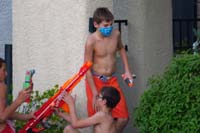 19-more_water_gun_fight_fun-Kenny_wears_a_mask-odd_combination