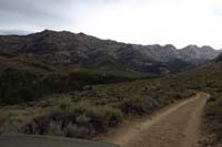 14-scenic_view_along_dirt_road_only_to_reach_end,turn_around_through_cattle,found_are_friend's_campsite