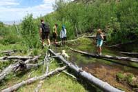 07-kids_on_the_beaver_dam,water_buildup_from_the_dam
