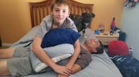 05-Kenny's_idea_to_pile_on_Daddy_while_waiting
