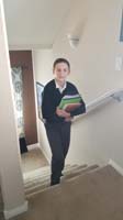 55-Kenny_brings_all_his_homework_up_the_stairs-amazingly_he's_excited_and_happy