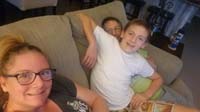 05-family_evening_time_on_the_couch-Kenny_working_on_'getting_comfortable'