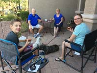 10-socially_distanced_doughnuts_with_Grammy_and_Grandpa_Duke_in_front_of_their_house