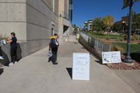 039-1pm-Kenny_enters_building_for_warm-ups,everyone_else_wait_outside_until_specific_event_to_watch_child