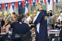 051-next_race-Kenny_receives_guidance_from_Coach_Thomas