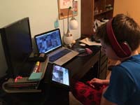 56-multi-tasking_while_playing_Minecraft_with_mouse_propped_for_action_while_watching_video_about_Minecraft