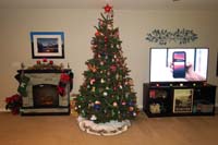 80-family_room_is_all_decorated_for_Christmas-even_with_stocking_on_our_new_fireplace