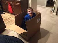 26-Kenny_decides_playing_in_big_box_from_Amazon_better_than_his_Christmas_gifts