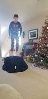 34-Kenny_trying_to_expand_bean_bag_chair_after_removing_from_box_and_packaging