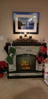 70-back_home,Christmas_over-Mommy_really_likes_her_fireplace_especially_when_decorated_for_Christmas