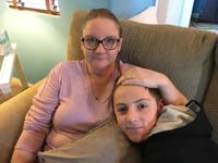 03-740am-Mommy_consoles_worried_Kenny_before_oral_surgery_to_remove_his_first_premolar_adult_teeth